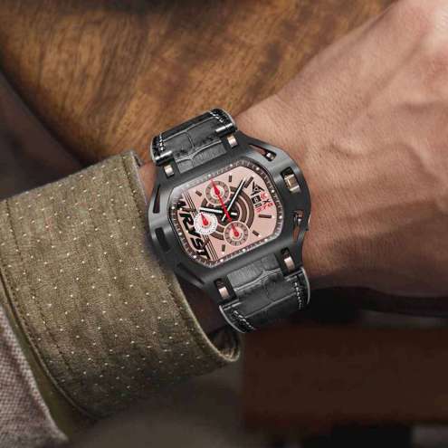 Photography of a man wearing a black and gold watch