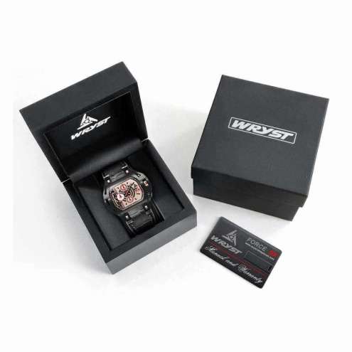 Watch box with a gold face black watch