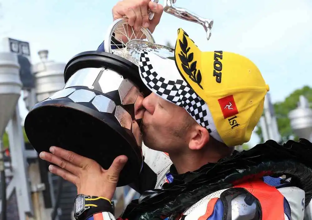 Winner of the TT races wearing Wryst TT watch